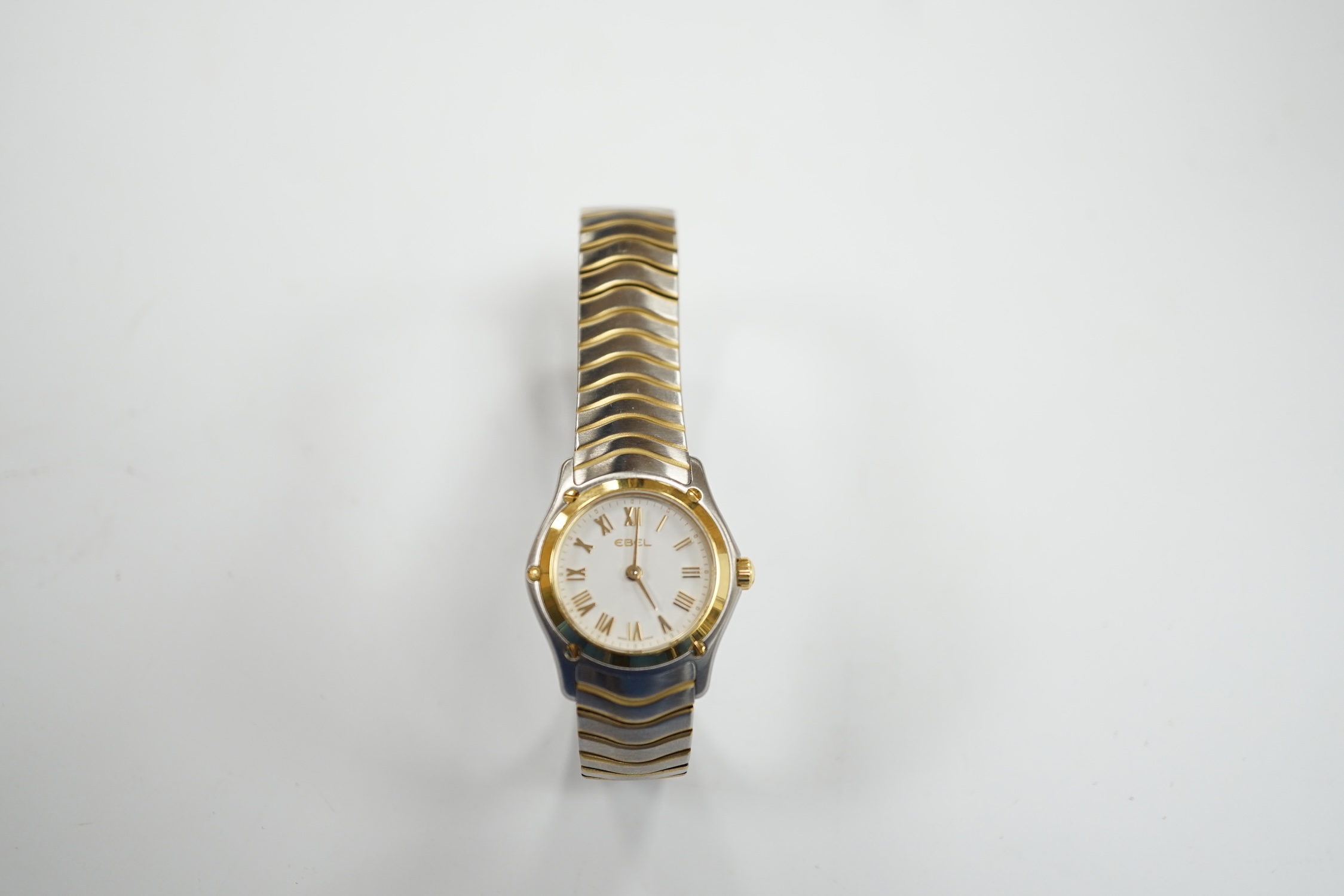 A lady's modern steel and gold plated Ebel Classic quartz wrist watch, with Roman dial.